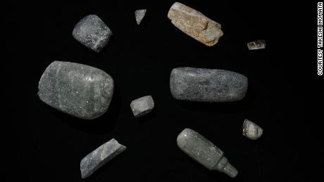 Axes excavated from the site, which date back to 1,000-700 BC. Other precious objects were also found.