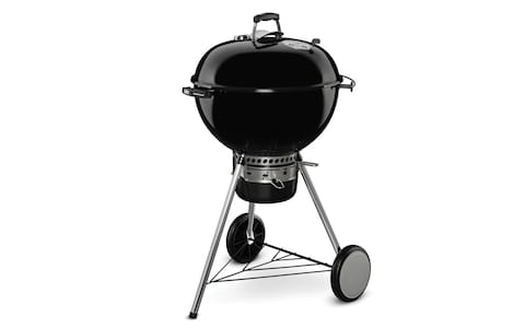 Black Weber BBQ on metal stand with wheels