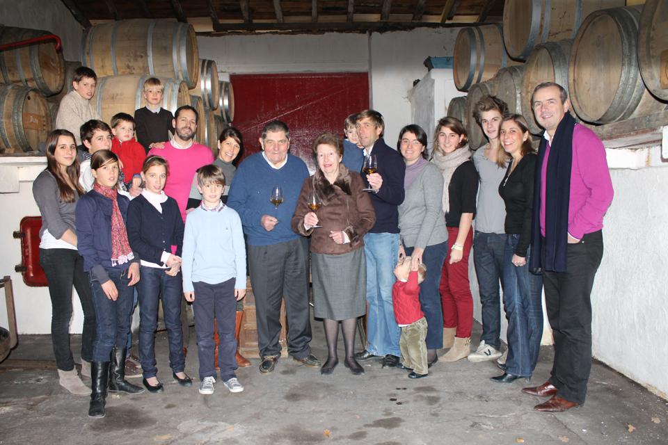 winemaking family in cellar, in France, Bordeaux