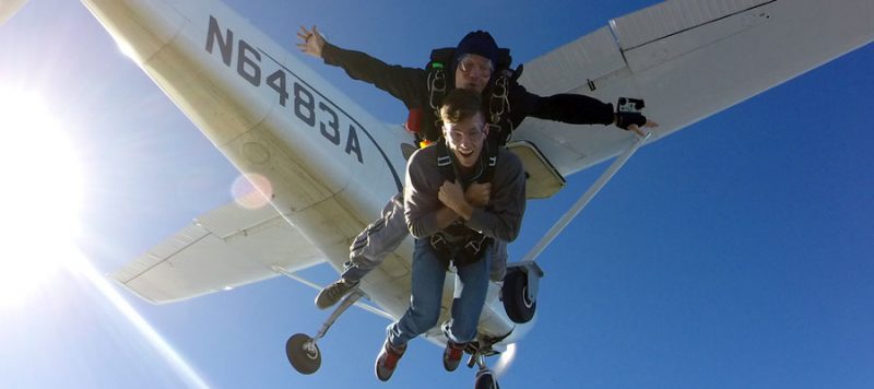 Two men tandem skydiving with Skydive Newport in Rhode Island